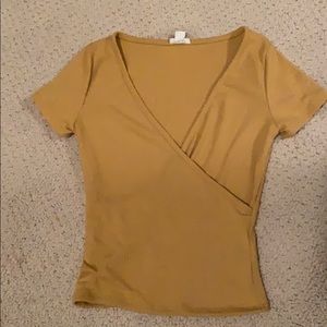 mustard yellow v-neck shirt